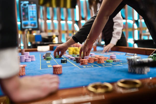 Live-dealer blackjack table with multi-camera studio setup on ns212